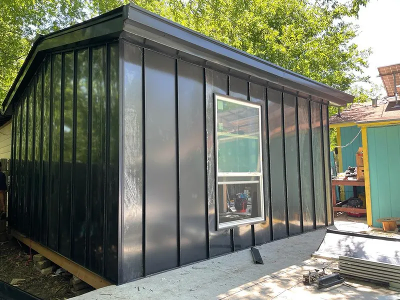 Black standing seam metal wall panels for Metal Roof Installation in Neshannock