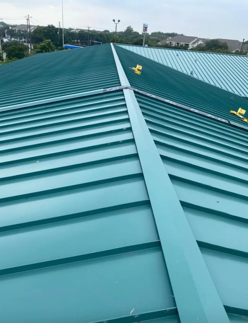 Green commercial metal roof ridge and valley for Metal Roof Repair in Neshannock